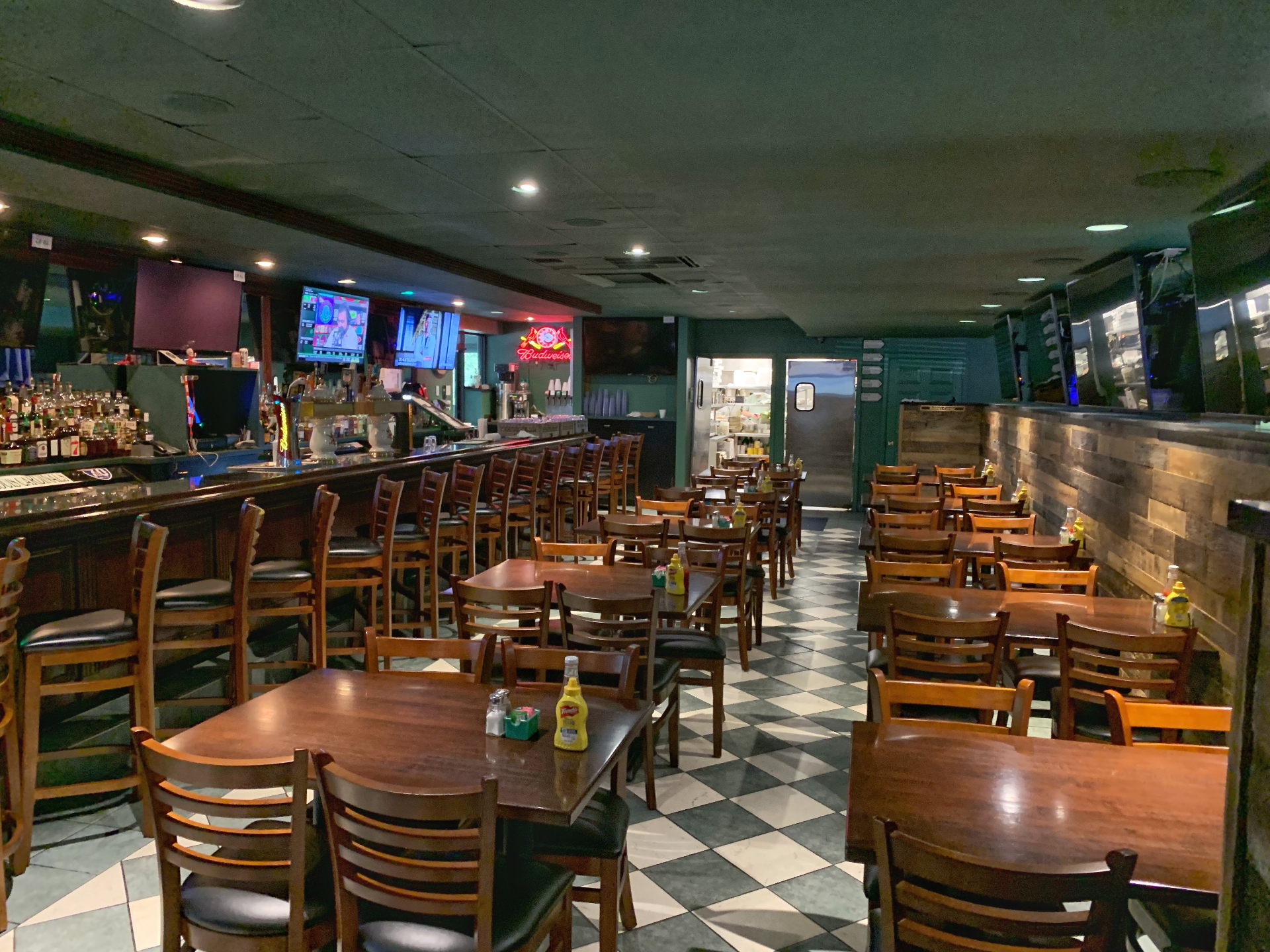 Main bar seating area with cold taps and hockey memorabilia